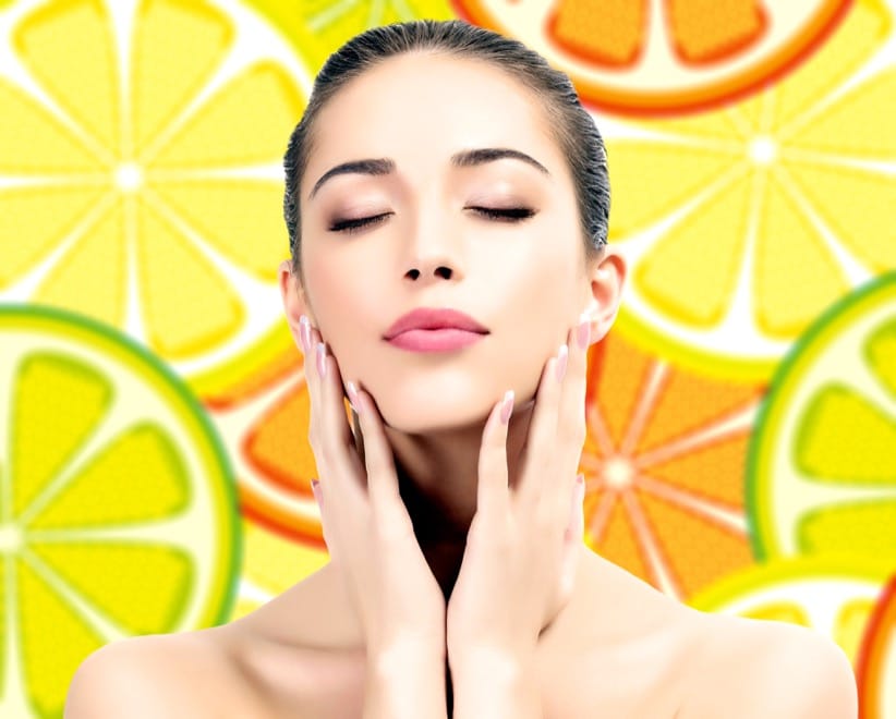 good looking female on a background with orange slices